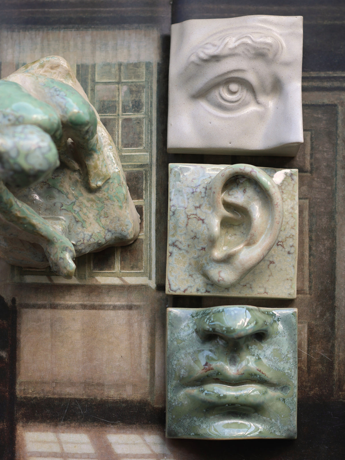 Kos, hand-picked trio of ceramic wall reliefs in Antique White, Crystal Green and Copper Green, stoneware by Laoru Laoru
